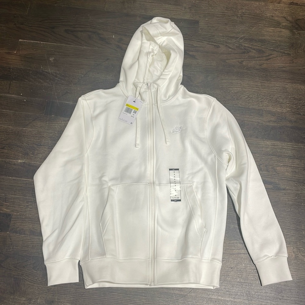 Brand new unworn Nike full zip cream colored hoody in multiple sizes.